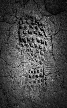 29206020-forgotten-footprint-in-the-moonlight-a-abstract-image-of-a-black-and-white-image-of-a-boot-print-in-